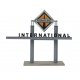International Truck Dealership -- Kit - 8-7/8 x 12-1/4 x 3-7/8′ 22 x 31.1 x 9.3cm, HO Walthers Cornerstone 4025