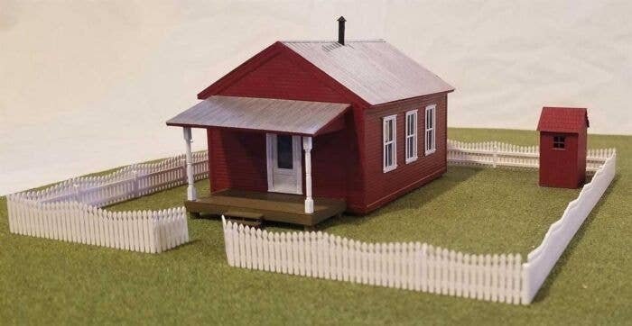 One-Room Schoolhouse - Kit -- Includes Fence & Outhouse - 2-3/4 x 4-1/2′ 7 x 11.4cm, HO, Tichy Train Group 7021