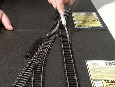 Track-Bed Roadbed Material -- Super Sheet - 12 x 24 x 1/8′ 5.1 x 9.4 x .3cm - HO Scale, HO, Woodland Scenics 1477