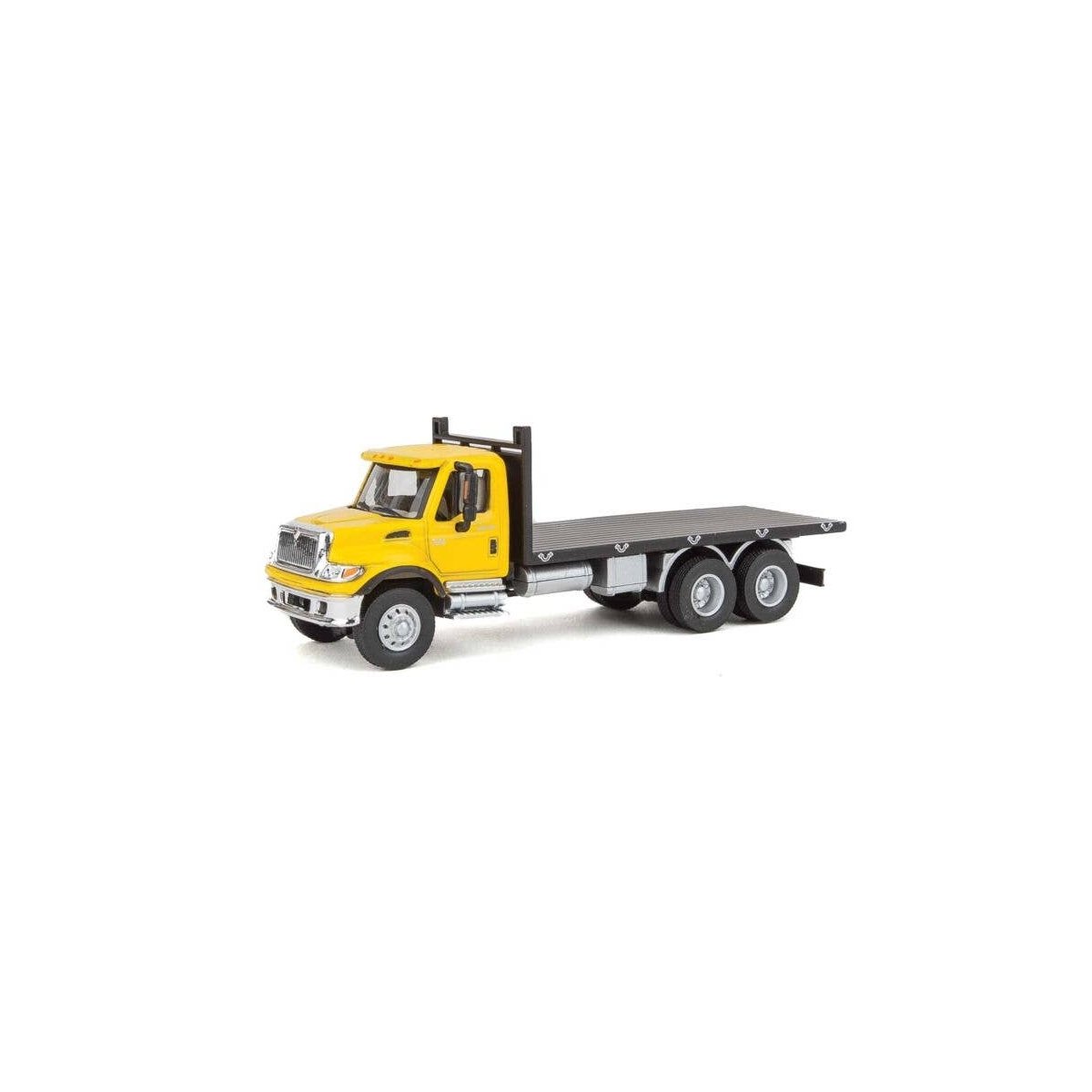 International(R) 7600 3-Axle Flatbed Truck - Assembled -- Yellow Cab, Black Flatbed, HO, Walthers SceneMaster 11653