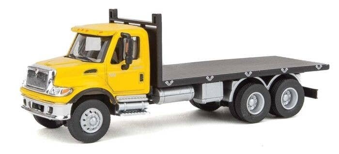 International(R) 7600 3-Axle Flatbed Truck - Assembled -- Yellow Cab, Black Flatbed, HO, Walthers SceneMaster 11653