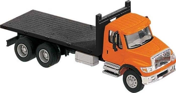 International(R) 7600 3-Axle Flatbed Truck - Assembled -- Orange Cab, Black Flatbed, HO, Walthers SceneMaster 11651
