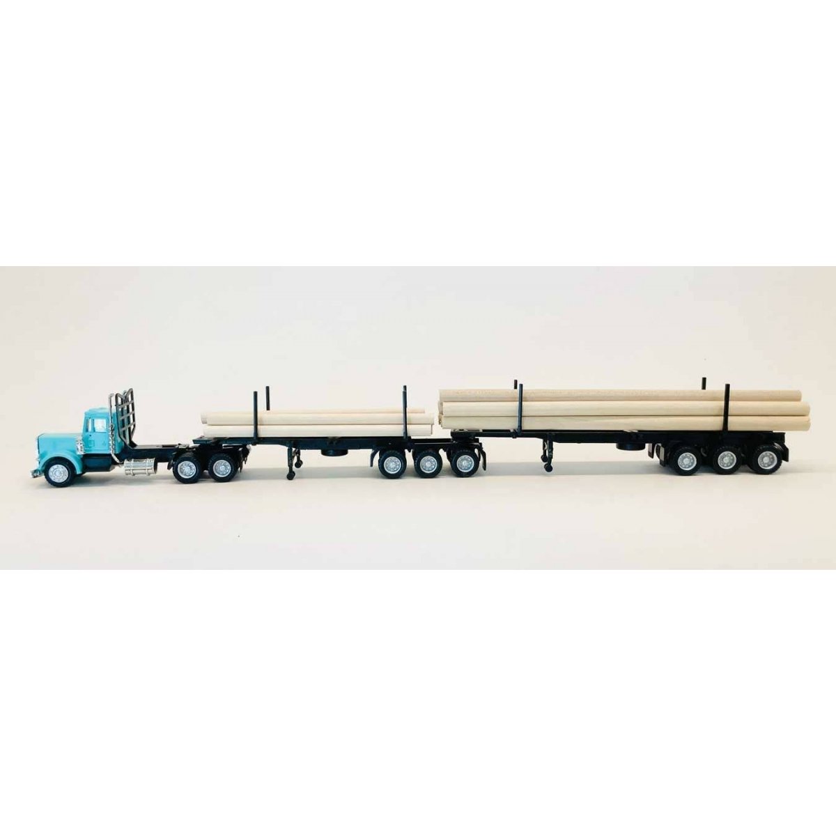 Peterbilt Super-B Tractor w/Log Trailer & Load - Assembled -- Light Blue, Black, HO, Herpa Models 6613
