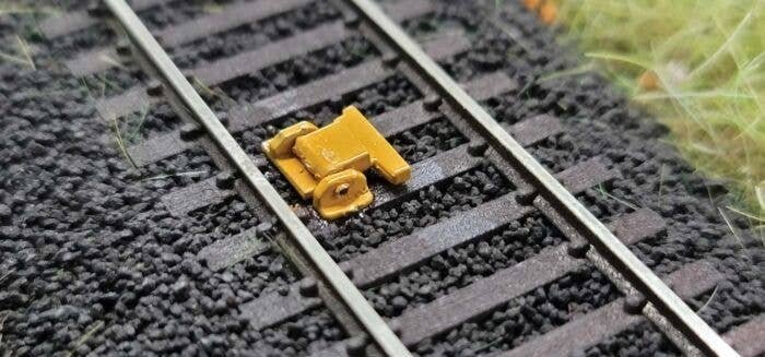 Track Derail -- Unpainted Metal Castings pkg(3), HO, Durango Press 214