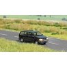 Chrysler Voyager Van with Working Headlights and Taillights - Assembled -- Black, HO, Busch Gmbh & Co Kg 5657