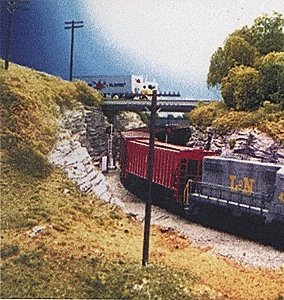 Railroad 30 & 40′ Telephone Poles Only (Brown Plastic pkg(36) -- Use w/Crossarms 628-31 or 35 (Both so, HO, Rix Products 30
