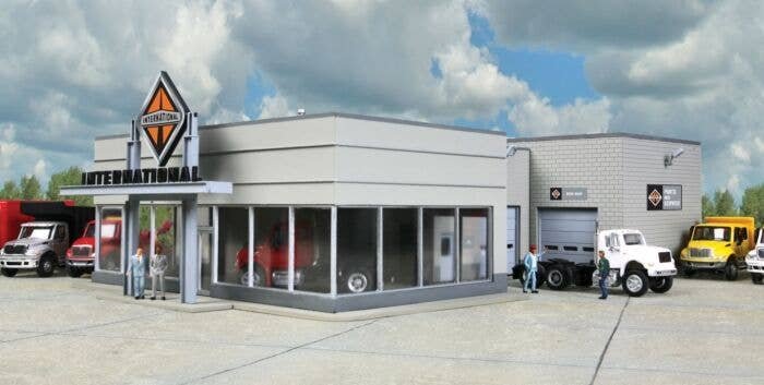 International Truck Dealership -- Kit - 8-7/8 x 12-1/4 x 3-7/8′ 22 x 31.1 x 9.3cm, HO, Walthers Cornerstone 4025