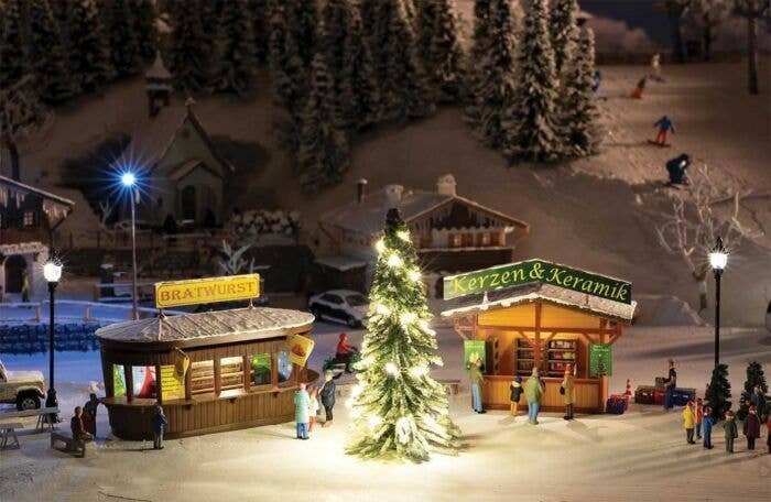 Christmas Market Stall 2-Pack with Lighted Tree -- Kit - 3-3/8 x 2-1/4 x 2-1/8` and 2-3/4 x 1-1/2 x 2-5/16`, HO, Faller Gmbh 134