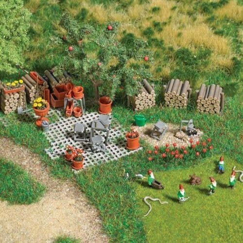 Garden Details Set -- Unpainted, 5 Gnomes, 6 Water Cans, 6 Woodpiles, 16 Pavers, Small Animals, HO, Busch Gmbh & Co Kg 1835