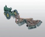 Farm Machinery (Unpainted Metal Kit) -- Styled Model A Tractor (1938-47) on Rubber Tires w/Drag D, HO, Woodland Scenics 207