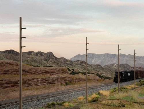 Intermediate Height Utility Poles (Wood) pkg(12) -- Kit - Each 6-1/4′ 17.5cm Scale Height: , HO, Walthers Cornerstone 4173