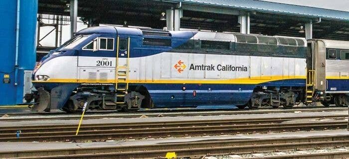 EMD F59PHI - 3-Rail w/True Blast Plus(R) Sound - Williams -- Amtrak California 2001 (blue, silver, yellow), O, Bachmann Industri